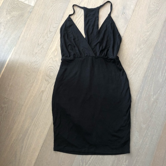 Olia Dresses & Skirts - Olia Sexy black racerback mini dress size large